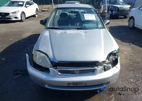 1997 Honda Civic Lx z USA, uszkodzony, nr VIN 2HGEJ6670VH527843